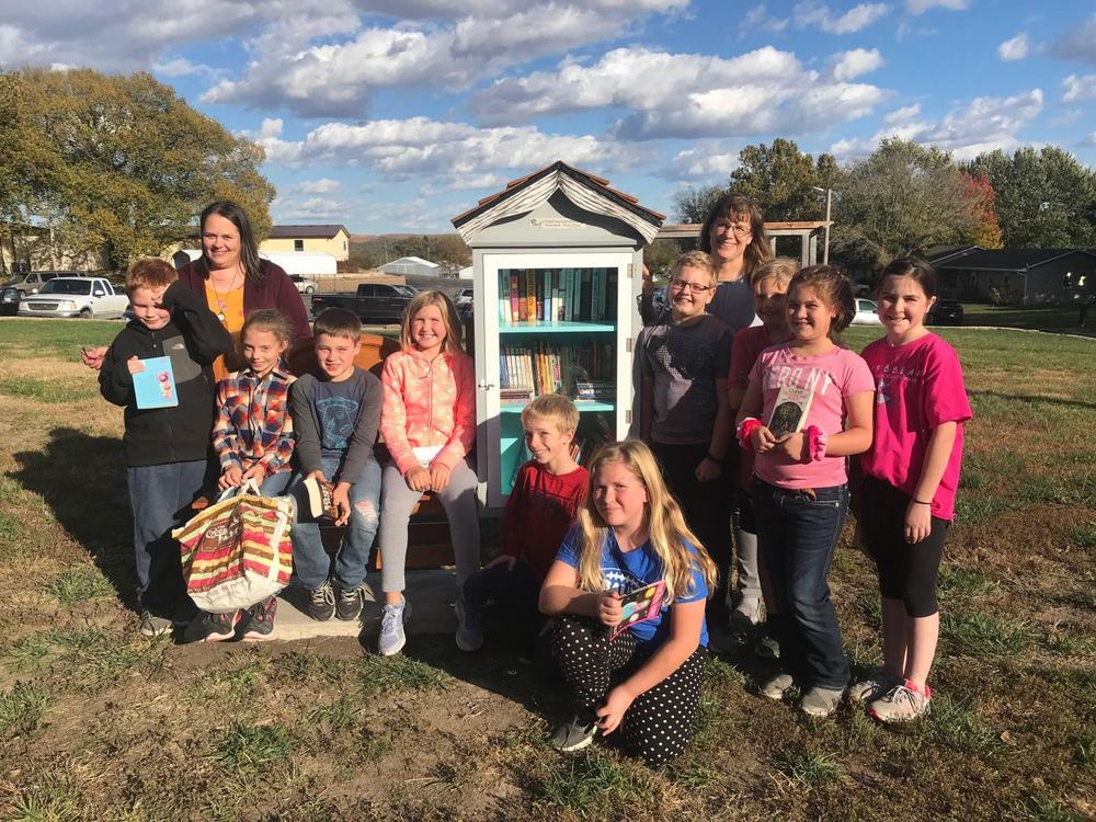 Alma Elementary School book club installs little library